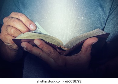 Man reading the Holy Bible.