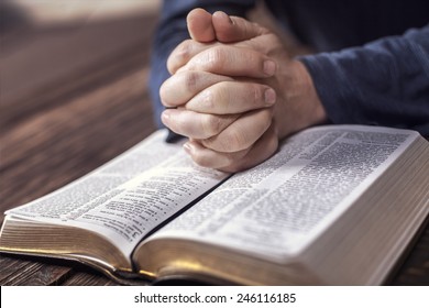 Man Reading From The Holy Bible, Close Up