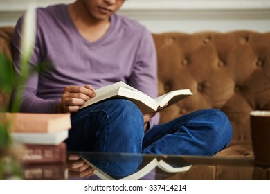 Man Reading Manual At Home, Selective Focus