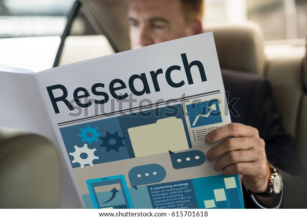 Man reading news network graphic overlay paper\
sitting in car