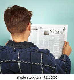 Man Reading The Newspaper