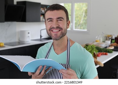 Man reading some notes before making some food in the kitchen 