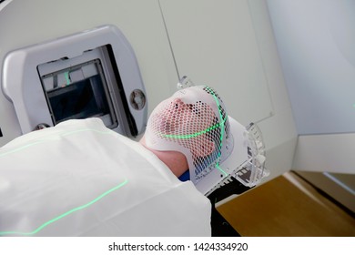 Man Receiving Radiation Therapy (Radiotherapy) Treatments For Brain Tumor