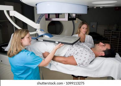 Man Receiving Radiation Therapy Treatments For Prostate Cancer