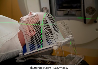 Man Receiving Radiation Therapy Treatments For A Brain Tumor