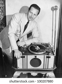 Man with record player