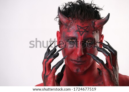 Man red skin angry devil satan