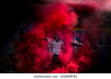 Man In Red Smoke Grenade