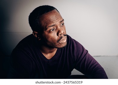 Man in reflection, harboring deep thoughts and emotions