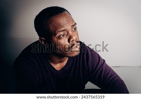 Man in reflection, harboring deep thoughts and emotions