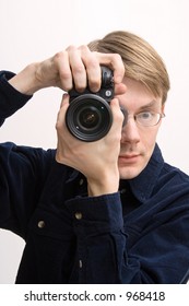Man with reflex camera