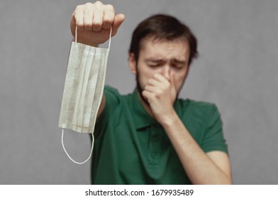 A Man Refuses To Wear A Medical Mask And Sneezes