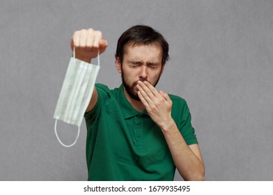 A Man Refuses To Wear A Medical Mask And Sneezes