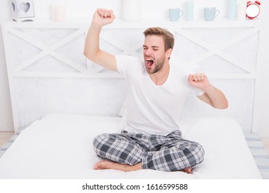 Man Relax In Bed. Perfect Morning. Yawn And Stretch In The Morning. Feeling Cosy And Comfortable. Menswear Pajamas. Pajamas For Home Relax. Male Feeling Sleepy. Yawning Man Sit In Pajama.