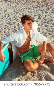 man relaxing after surfing