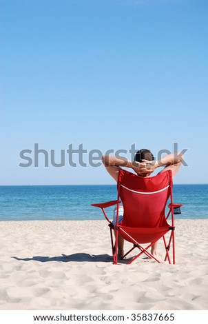 Man relaxing on deckchair
