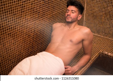 Man Relaxing In A Steam Room