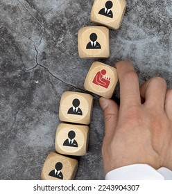 Man removing cube from table. Concept of dismissal