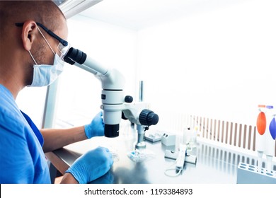 Man researcher carrying out scientific research lab