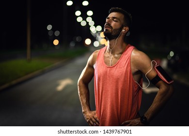 Man resting after night workout in the city. - Powered by Shutterstock