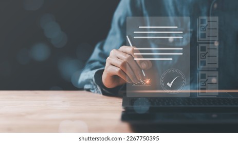 a man reviewing and managing business documents and agreements online,signing a business contract approval of contract documents confirmation or warranty certificate,employment idea, project review - Shutterstock ID 2267750395