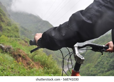 Man Riding Bicycle At Banos, Ecuador