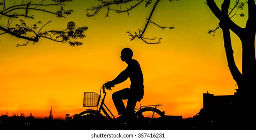 Man Riding Bicycle On Sunset Backgroundsilhouette Stock Photo (Edit Now ...