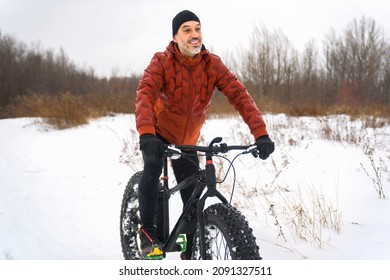 Man Riding A Fat Bike In Winter