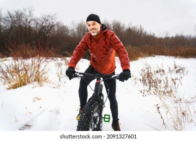 Man Riding A Fat Bike In Winter