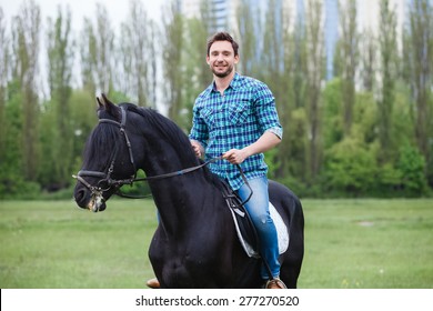 Man Riding A Horse