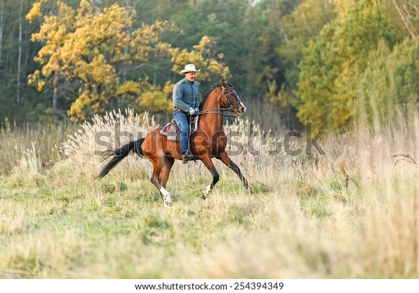 Man Riding Horse Autumn Landscape Stock Photo (Edit Now) 254394349