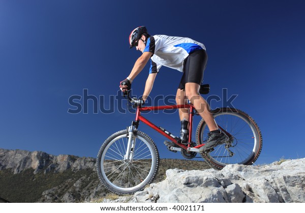 Man Riding Mountain Bike Downhill Style Stock Photo (Edit Now) 40021171