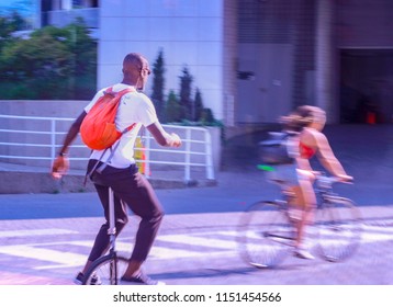 Man Riding Uni Cycle