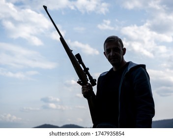 Man With Rifle And Sniper Silhouette