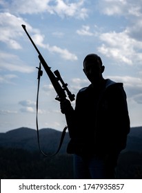 Man With Rifle And Sniper Silhouette