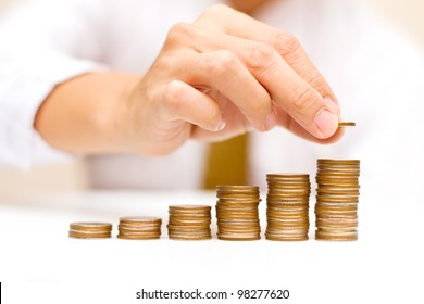 a man rising coins
