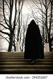 Man In A Robe Climbing Stairs