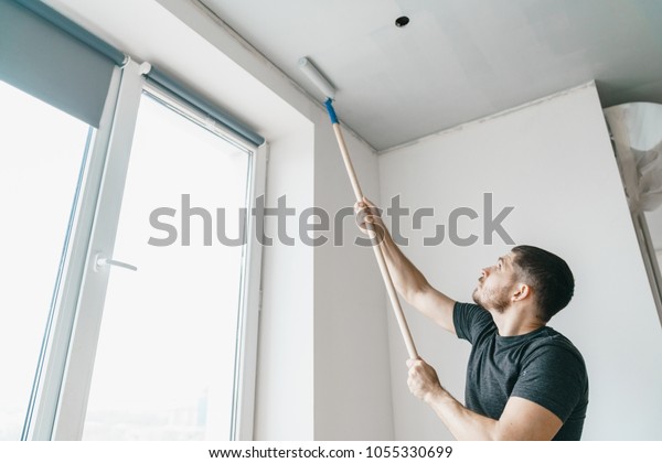 Man Roller His Hands Paints Ceiling Stock Photo Edit Now