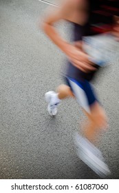 Man Running In City Marathon - Motion Blur