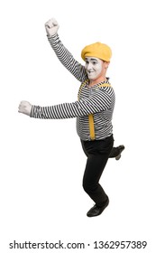 Man Running Up To Jump With A Pole. Male Mime Artist As A Pole Vaulter On White Background.