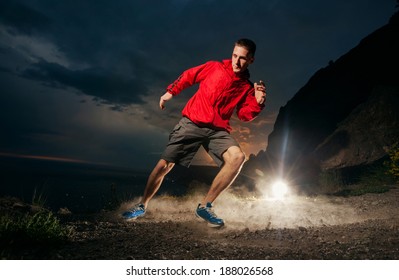 Man Running In The Mountains At Night