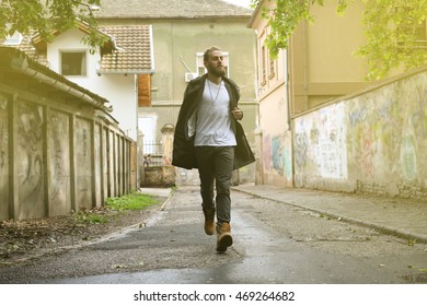 Man Running On The Street. 