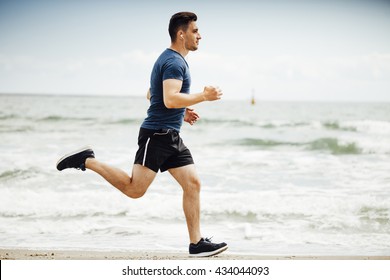 Man Running On Sunny; Beach