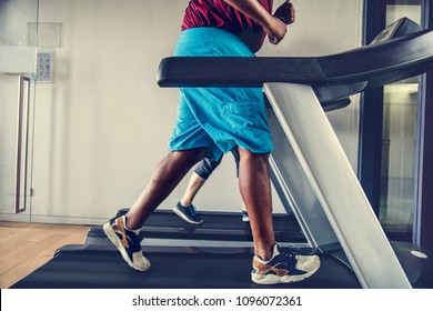 Man Running On A Treadmill