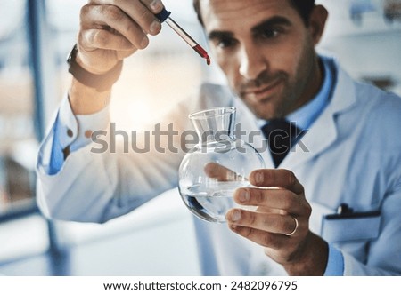 Man, sample and scientist for experiment in beaker with chemicals research, red liquid and biotech study of health. Researcher, chemistry and pharmaceutical, analysis and vaccine with dropper in lab