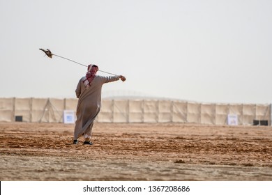 A man from Saudi Arabia train his falcon - Powered by Shutterstock