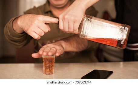 Man Saying No More To Alcohol With His Body Language