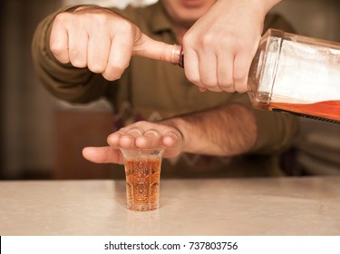 Man Saying No More To Alcohol With His Body Language