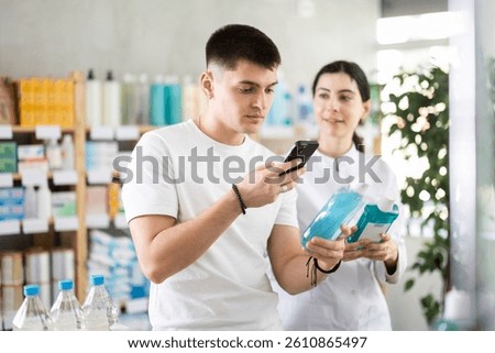 Man scans QR code on mouthwash label. Female pharmacist offers to choose the right mouthwash