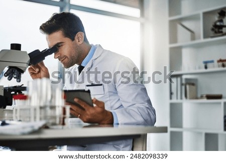 Man, science and microscope with tablet in laboratory for medical research, planning and monitor experiment or observation. Doctor, technology and internet for scientific calculations and analysis.